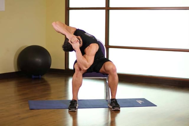Seated Chair Twist, finish position