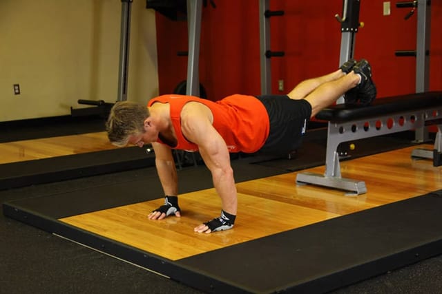 Feet-Elevated Push-Up, start position
